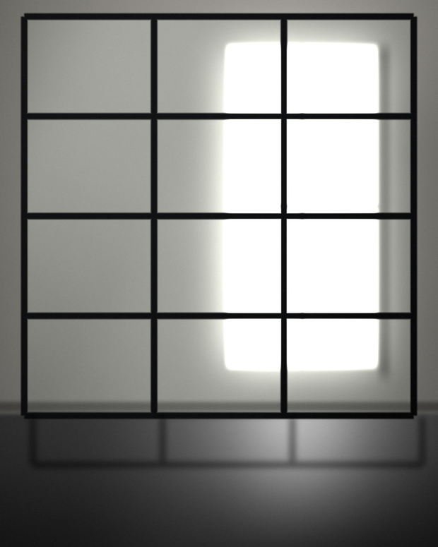 A steel-framed glass partition in a bright room, its dark grid throwing a long shadow across the floor.